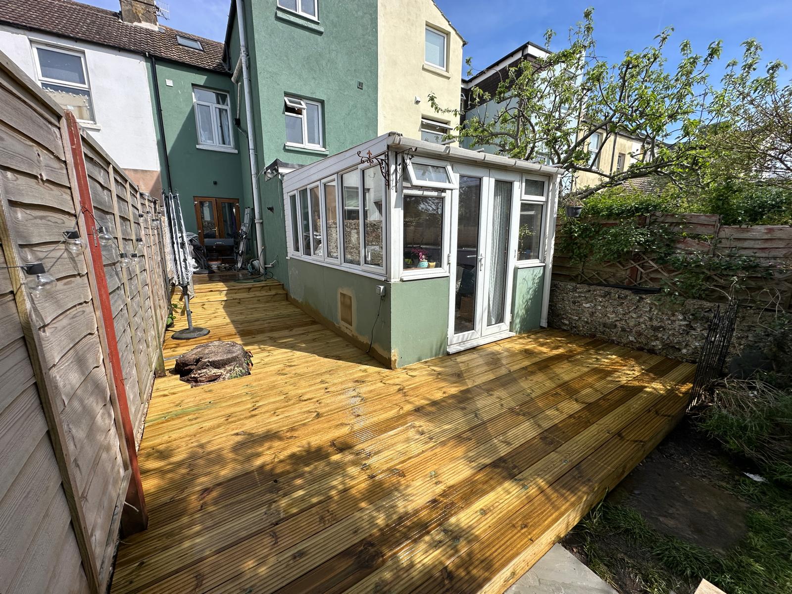 Composite decking installation creating beautiful outdoor living spaces.