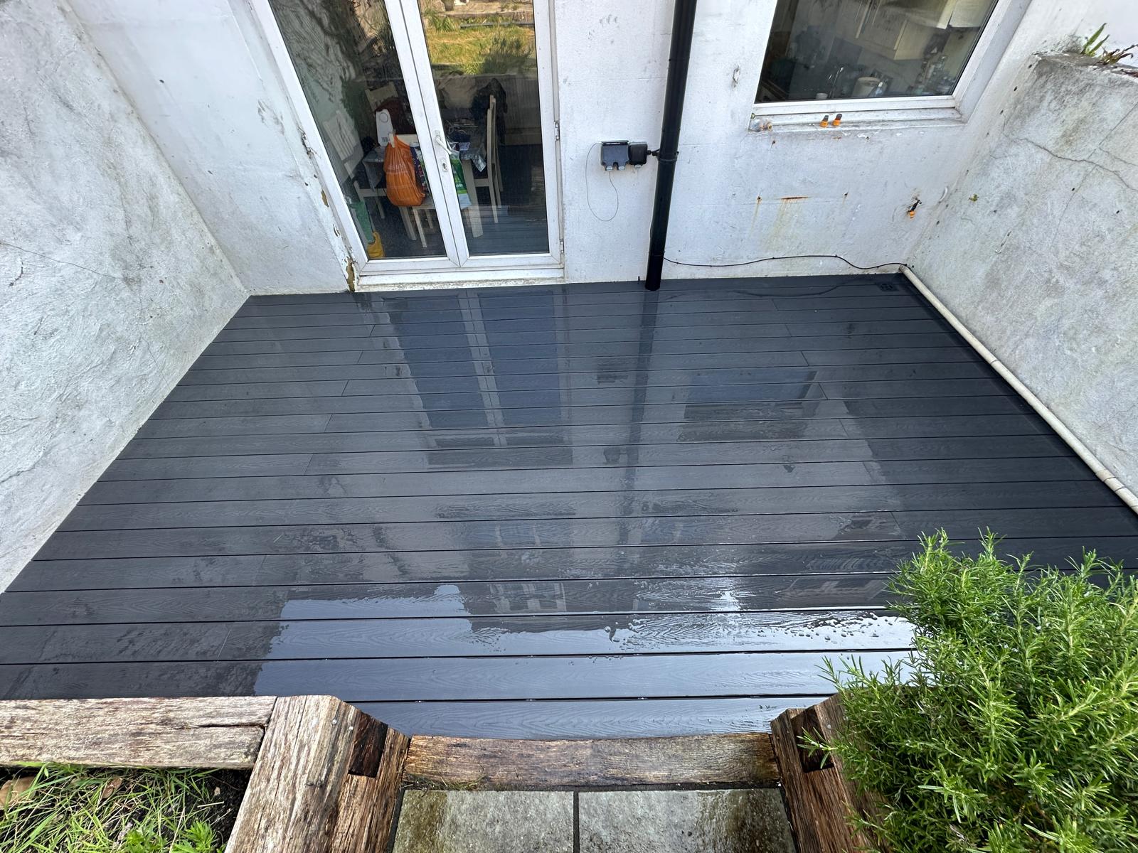 Professional decking installation with premium materials and expert craftsmanship.