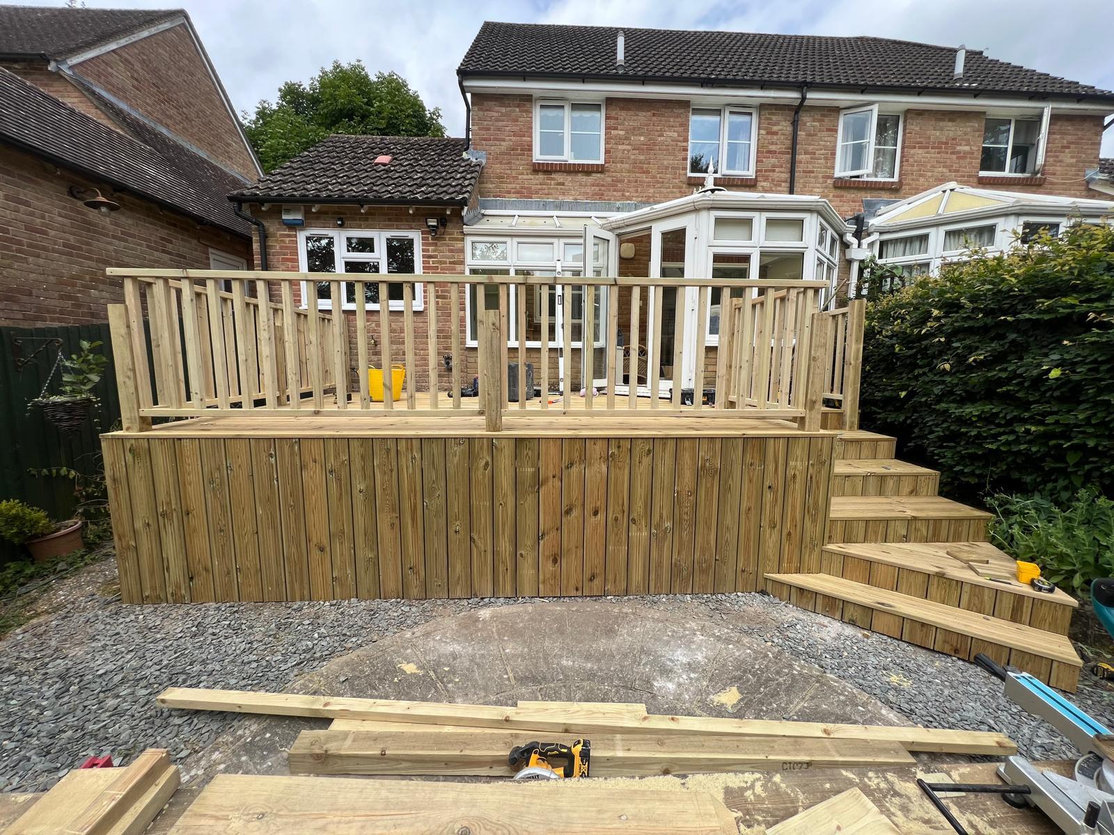 Timber decking installation with professional finishing and attention to detail.